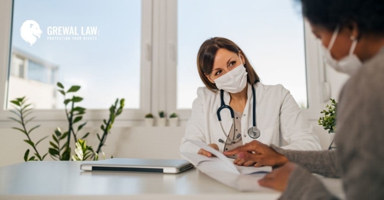 Female doctor talking to female patient.